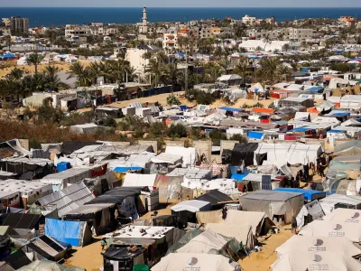 Displaced Palestinians, who fled their houses due to Israeli strikes, shelter at a tent camp, amid the ongoing conflict between Israel and the Palestinian Islamist group Hamas, in Rafah in the southern Gaza Strip, February 29, 2024. REUTERS/Ibraheem Abu Mustafa