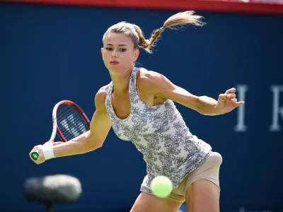 15 August 2021, Canada, Montreal: Italian tennis player Camila Giorgi in action against Czech Karolina Pliskova during their Women's singles final tennis match of the 2021 National Bank Open tennis tournament. Photo: David Kirouac/CSM via ZUMA Wire/dpa