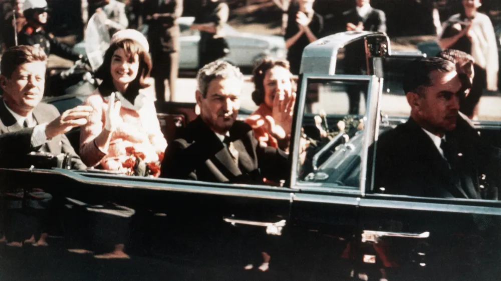 Prior to the assassination, President John F Kennedy, First Lady Jacqueline Kennedy, and Texas Governor John Connally ride through the streets of Dallas, Texas on November 22, 1963. Included as an exhibit for the Warren Commission. (Photo by © CORBIS/Corbis via Getty Images)