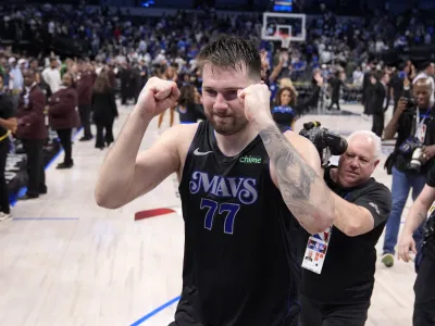 Dallas Mavericks' Luka Doncic celebrates the teams win in Game 6 of an NBA basketball second-round playoff series against the Oklahoma City Thunder Saturday, May 18, 2024, in Dallas. (AP Photo/Tony Gutierrez)