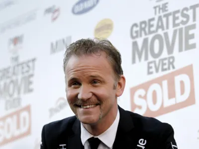 FILE - Filmmaker Morgan Spurlock arrives at the premiere of "Pom Wonderful Presents: The Greatest Movie Ever Sold" in Los Angeles on Wednesday, April 20, 2011. Spurlock, an Oscar-nominee who made food and American diets his life's work, famously eating only at McDonald's for a month to illustrate the dangers of a fast-food diet, has died. He was 53. (AP Photo/Matt Sayles, File)