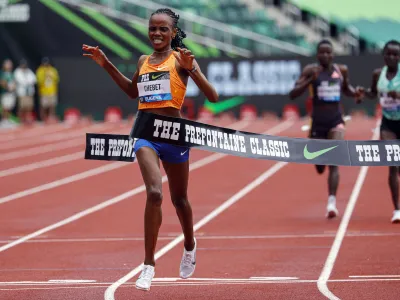Beatrice Chebet of Kenya, sets a world record in the 10,000 with a time of 28:54.14, during the Prefontaine Classic track and field meet Saturday, May 25, 2024, in Eugene, Ore. (AP Photo/Thomas Boyd)