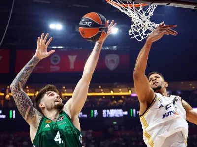 Basketball - EuroLeague - Final - Real Madrid v Panathinaikos BC - Uber Arena, Berlin, Germany - May 26, 2024 Panathinaikos BC's Juancho Hernangomez in action with Real Madrid's Walter Tavares REUTERS/Fabrizio Bensch
