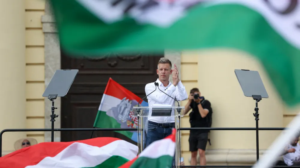 Peter Magyar, former government insider and leader of the Respect and Freedom (TISZA) Party, applauds during an anti-government protest in Debrecen, Hungary, May 5, 2024. REUTERS/Bernadett Szabo