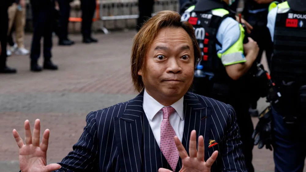 Lawrence Lau Wai-chung arrives at the West Kowloon Magistrates' Courts building, before the verdict of the 47 pro-democracy activists charged under the national security law, in Hong Kong, China, May 30, 2024. REUTERS/Tyrone Siu   TPX IMAGES OF THE DAY