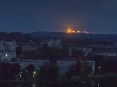 01 June 2024, Ukraine, Lviv: Explosions are visible at a distance from a massive Russian missile attack on Ukrainian infrastructure with missiles on the morning of 01 June. Russia once again has attacked underground gas storage facilities in western Ukraine. Photo: Artur Abramiv/ZUMA Press Wire/dpa