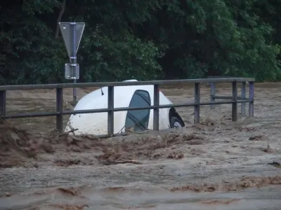 09 June 2024, Austria, Schäffern: A car submerged in water as torrential rainfall once again caused numerous floods early 09 June in Austria. Photo: Einsatzdoku.At Patrik Lechner/APA/dpa