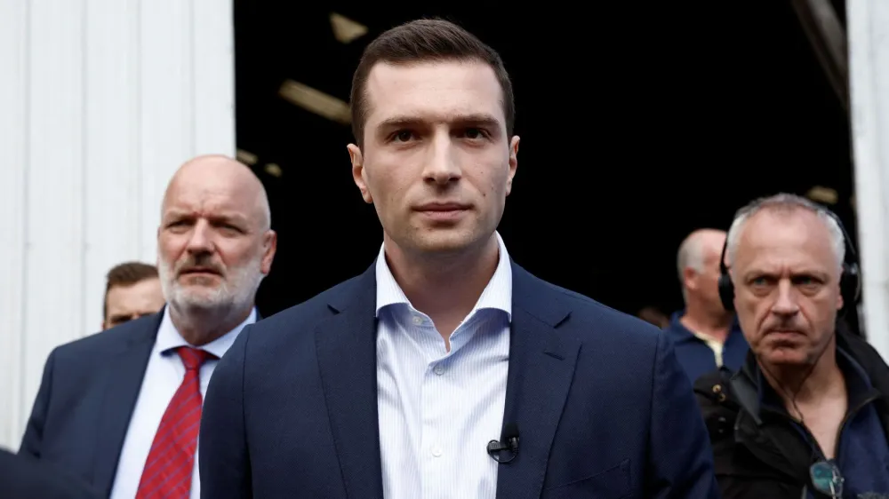 Jordan Bardella, President of the French far-right National Rally (Rassemblement National - RN) party, visits a farm on his first campaign trip for the upcoming French parliamentary elections, in Chuelles, near Montargis, France, June 14, 2024. REUTERS/Benoit Tessier