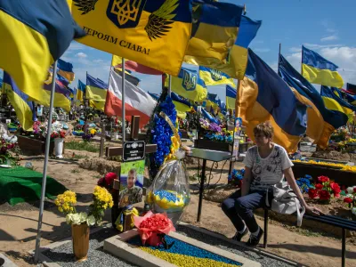 Harkiv vojaško pokopališče 1805.2024 - UKRAJINA - Reportaža Ukrajina pred poletno ofenzivoFOTO: Luka Cjuha