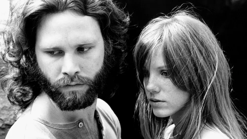 HOLLYWOOD - 1969: Singer Jim Morrison of The Doors with girlfriend Pamela Courson during a 1969 photo shoot at Bronson Caves in the Hollywood Hills, California. (Photo by Estate of Edmund Teske/Michael Ochs Archives/Getty Images)