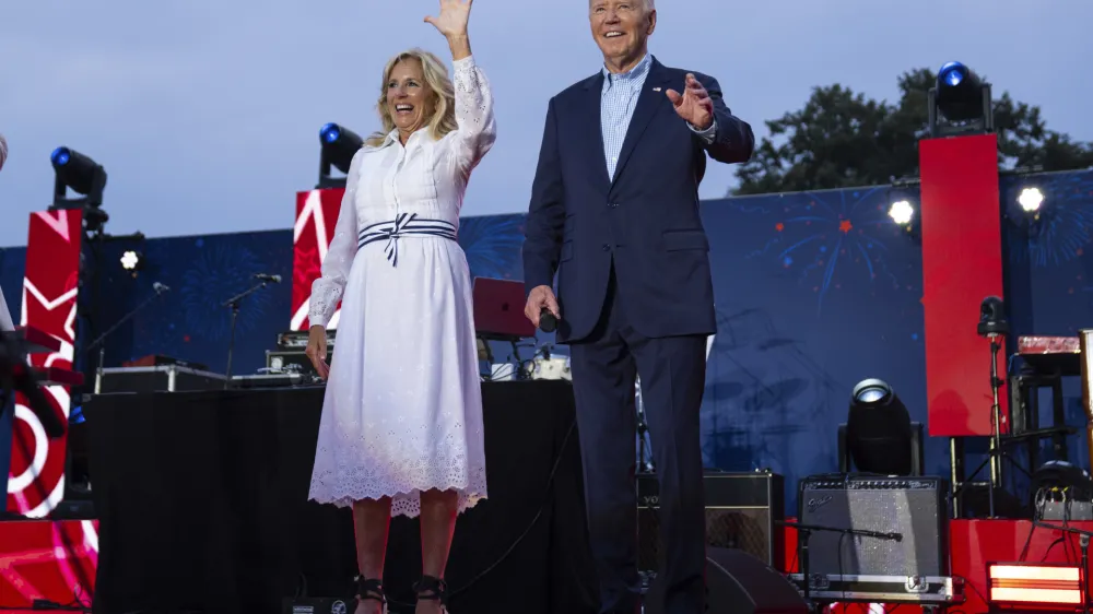 President Joe Biden and first lady Jill Biden arrive for a Fourth of July celebration for military and veteran families on the South Lawn of the White House, Thursday, July 4, 2024, in Washington. (AP Photo/Evan Vucci)