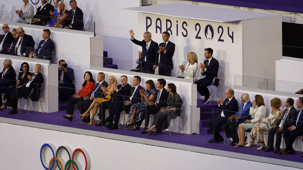 Paris 2024 Olympics - Ceremonies - Paris 2024 Closing Ceremony - Stade de France, Saint-Denis, France - August 11, 2024. International Olympic Committee (IOC) President Thomas Bach, President of France Emmanuel Macron, his wife, Brigitte Macron, and Paris 2024 President Tony Estanguet are pictured during the closing ceremony. REUTERS/Anushree Fadnavis