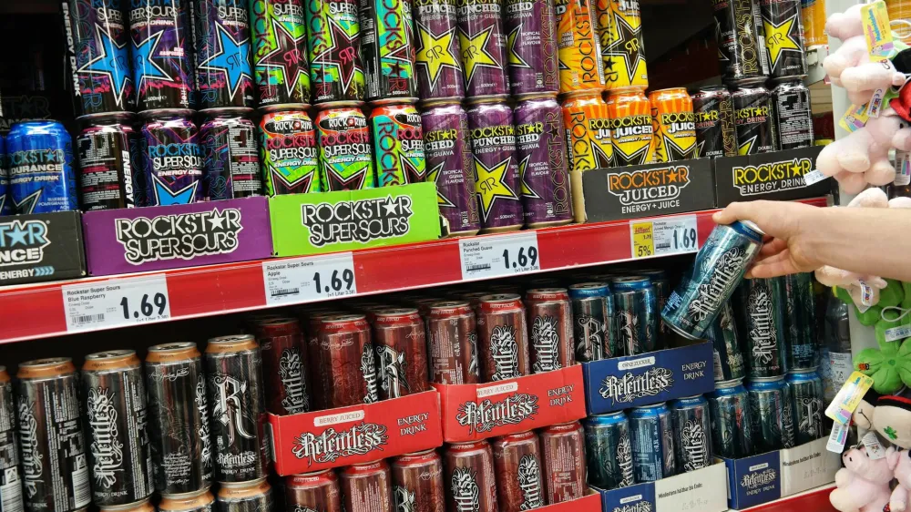 ET5FPJ Aisle with a variety of Energy drinks in metal cans in a Kaufland supermarket.