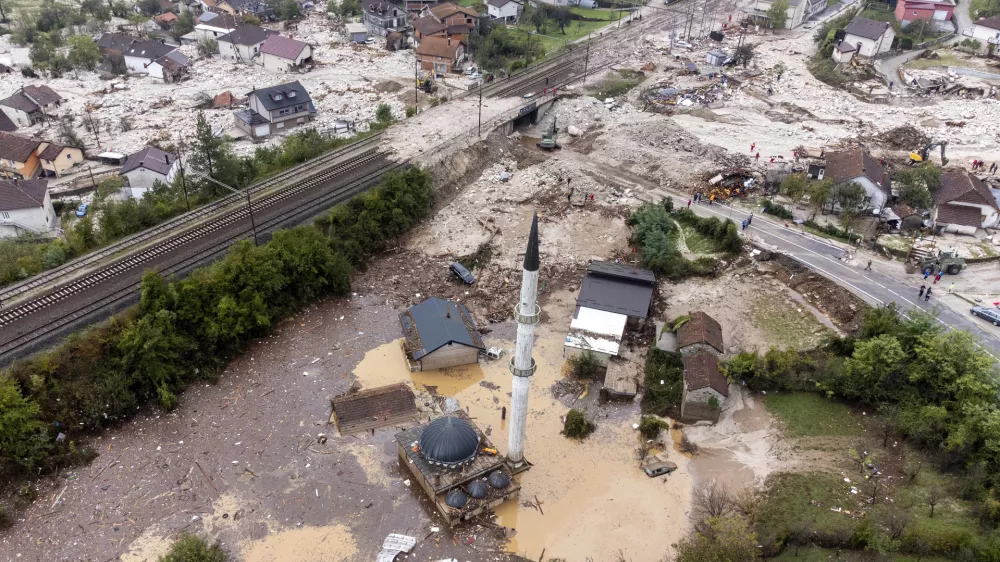 An aerial view shows the area destroyed by a landslide in Donja Jablanica, Bosnia, Saturday, Oct. 5, 2024. (AP Photo/Armin Durgut)