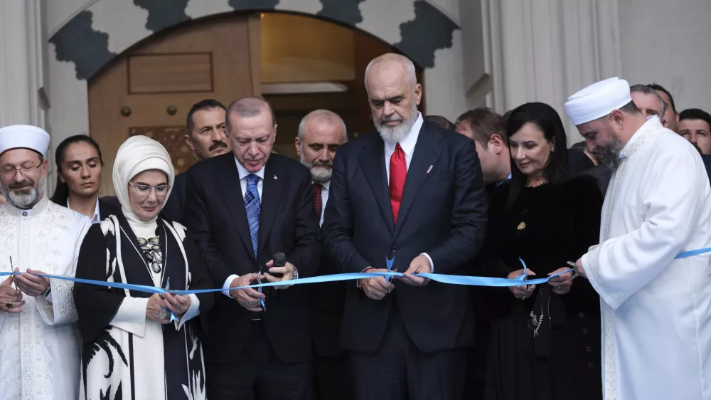 Turkish President Tayyip Erdogan, centrer left, next to his wife Emine Erdogan, second left, and Albania's Prime Minister Edi Rama, center right, during the inauguration of The Turkish-funded new Namazgah mosque, one of the largest in the Balkans in Tirana, Albania Thursday, Oct. 10, 2024. (AP Photo/Vlasov Sulaj)