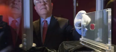 David Redden, Sotheby's Vice Chairman, with the 1856 British Guiana 1c Magenta stampPress preview of the most expensive stamp in the world, Sotheby's, London, Britain - 02 Jun 2014An extremely rare stamp is expected to sell up to  million (GBP 11.8 million) at auction. The small, octagonal-shaped British Guiana 1c Magenta stamp will go under the hammer at a Sotheby's auction in New York on 17 June. It is the only known surviving example of its kind and dates from 1856. Printed in black on magenta paper, it features a sailing ship with the colony's Latin motto 'Damus Petimus Que Vicissim', which translates to ?We give and expect in return.? It is so rare that it been previously dubbed 'the Holy Grail of stamps.',Image: 236277645, License: Rights-managed, Restrictions:, Model Release: no / Foto: Profimedia