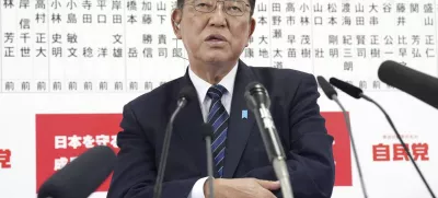 Japan's Prime Minister and president of the Liberal Democratic Party (LDP) Shigeru Ishiba speaks to the media regarding the early result of lower house election, at the LDP headquarters Sunday, Oct. 27, 2024, in Tokyo, (Kyodo News via AP)