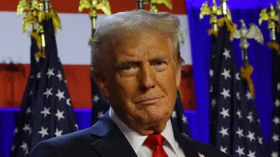 Republican presidential nominee and former U.S. President Donald Trump gestures as he stand on stage at his rally, at the Palm Beach County Convention Center in West Palm Beach, Florida, U.S., November 6, 2024. REUTERS/Brian Snyder