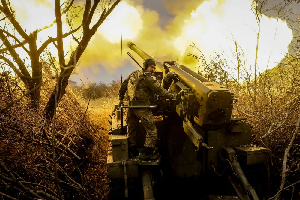 FILE PHOTO: A serviceman of 24th Mechanized brigade named after King Danylo of the Ukrainian Armed Forces fires a 2s5 "Hyacinth-s" self-propelled howitzer towards Russian troops at a front line, amid Russia's attack on Ukraine, near the town of Chasiv Yar in Donetsk region, Ukraine November 18, 2024. Oleg Petrasiuk/Press Service of the 24th King Danylo Separate Mechanized Brigade of the Ukrainian Armed Forces/Handout via REUTERS ATTENTION EDITORS - THIS IMAGE HAS BEEN SUPPLIED BY A THIRD PARTY./File Photo