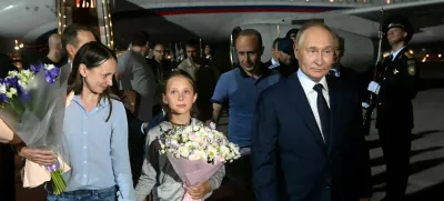 FILE PHOTO: Russian President Vladimir Putin welcomes Russian nationals, including Artyom Dultsev, Anna Dultseva and their children, following a prisoner exchange between Russia with Western countries, during a ceremony at Vnukovo International Airport in Moscow, Russia August 1, 2024. Sputnik/Mikhail Voskresensky/Pool via REUTERS ATTENTION EDITORS - THIS IMAGE WAS PROVIDED BY A THIRD PARTY./File Photo