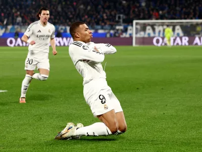 Soccer Football - Champions League - Atalanta v Real Madrid - Gewiss Stadium, Bergamo, Italy - December 10, 2024 Real Madrid's Kylian Mbappe celebrates scoring their first goal REUTERS/Guglielmo Mangiapane   TPX IMAGES OF THE DAY