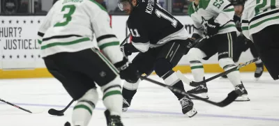 Dec 4, 2024; Los Angeles, California, USA; Los Angeles Kings center Anze Kopitar (11) skates against the Dallas Stars during the second period of a hockey game at Crypto.com Arena. Mandatory Credit: Jessica Alcheh-Imagn Images