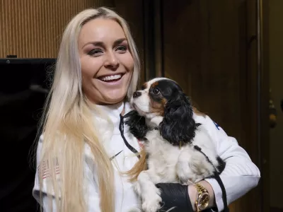 ﻿United States alpine skier Lindsey Vonn holds her dog Lucy after a press conference at the 2018 Winter Olympics in Pyeongchang, South Korea, Friday, Feb. 9, 2018. (AP Photo/J. David Ake)