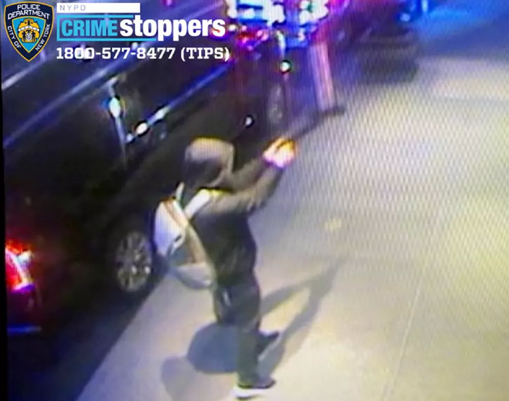 An image of the individual sought in connection to the investigation of the shooting death of Brian Thompson, the CEO of UnitedHealth's insurance unit, is seen in a still image from surveillance video taken outside a hotel in the Manhattan borough of New York City, U.S. December 4, 2024. NYPD News/Handout via REUTERS.  THIS IMAGE HAS BEEN SUPPLIED BY A THIRD PARTY