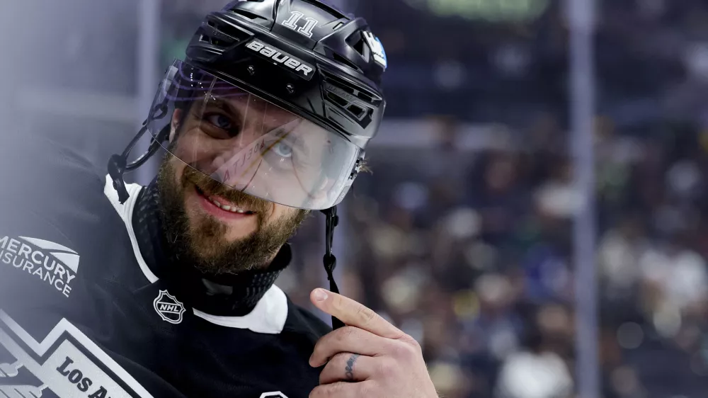 Dec 7, 2024; Los Angeles, California, USA; Los Angeles Kings center Anze Kopitar (11) skates against the Minnesota Wild at Crypto.com Arena. Mandatory Credit: Ryan Sun-Imagn Images