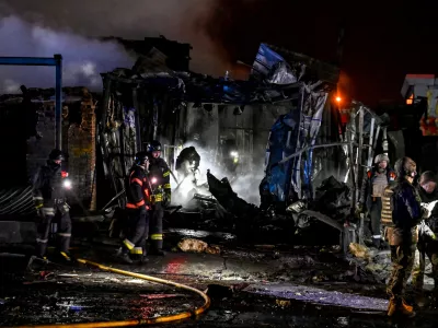 06 December 2024, Ukraine, Zaporizhzhia: First responders deal with the consequences of a Russian airstrike in Zaporizhzhia in south-eastern Ukraine. Several people have been killed in a Russian glide bomb attack in the south-eastern Ukrainian city of Zaporizhzhia. Photo: -/Ukrinform/dpa