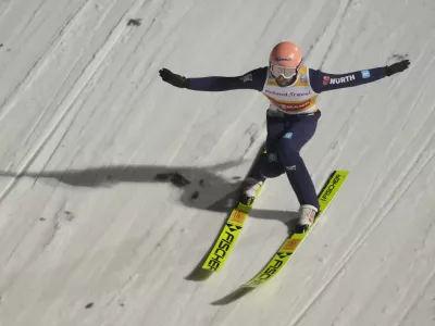 Germany's Pius Paschke in action during the men's individual HS134 Ski Jumping World Cup in Wisla, Poland, Saturday, Dec. 7, 2024. (AP Photo/Czarek Sokolowski)