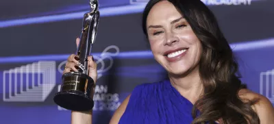 Karla Sofia Gascon, of Spain, winner of the European Actress category for "Emilia Perez", poses with her statuette during the European Film Awards gala at the Culture and Convention Center KKL in Lucerne, Switzerland, Saturday, Dec. 7, 2024.(Philipp Schmidli/Keystone via AP)