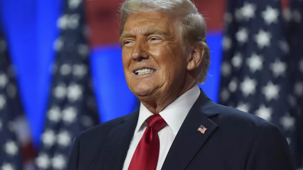 FILE - Republican presidential nominee former President Donald Trump smiles at an election night watch party at the Palm Beach Convention Center, Nov. 6, 2024, in West Palm Beach, Fla. (AP Photo/Evan Vucci, File)