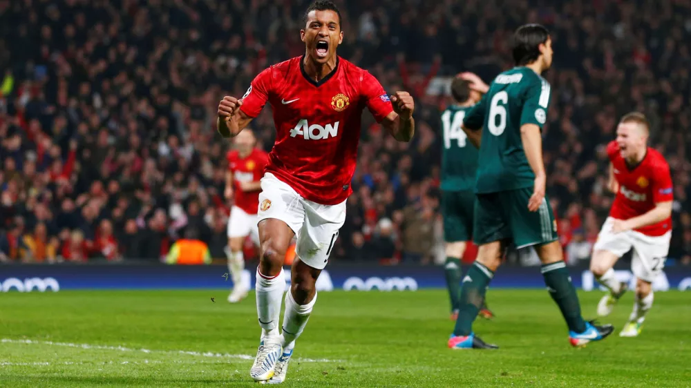 FILE PHOTO: Football - Manchester United v Real Madrid - UEFA Champions League Second Round Second Leg - Old Trafford, Manchester, England - 5/3/13  Manchester United's Nani celebrates after Real Madrid's Sergio Ramos (not in picture) scored an own goal for Manchester United's first  Mandatory Credit: Action Images / Jason Cairnduff  Livepic/File Photo