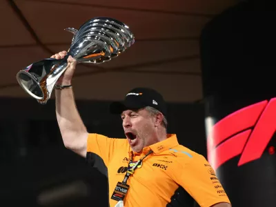 Formula One F1 - Abu Dhabi Grand Prix - Yas Marina Circuit, Abu Dhabi, United Arab Emirates - December 8, 2024 McLaren chief executive Zak Brown celebrates with a trophy after McLaren's Lando Norris wins the Abu Dhabi Grand Prix REUTERS/Jakub Porzycki