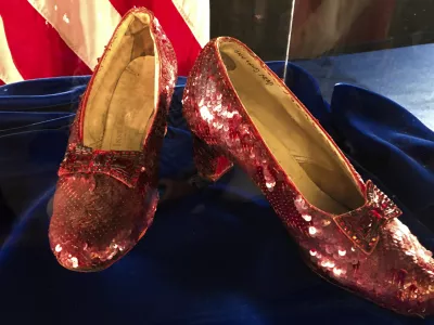 FILE - Ruby slippers once worn by Judy Garland in the "The Wizard of Oz," are displayed at a news conference, Sept. 4, 2018, at the FBI office in Brooklyn Center, Minn. (AP Photo/Jeff Baenen, File)