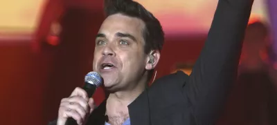 Robbie Williams bo zvezda julijskega koncerta v Trstu. / Foto: AP