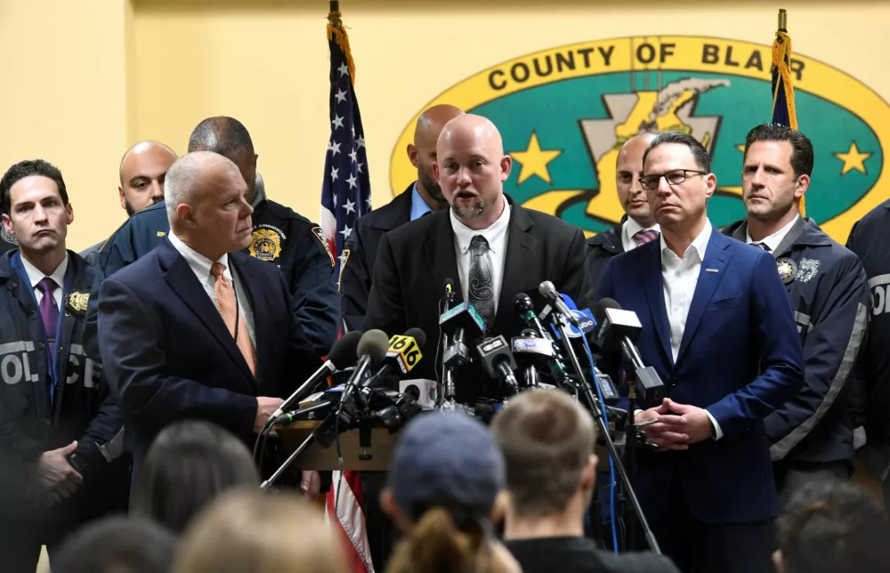 Officials at the Blair County Courthouse attend a press conference following Luigi Mangione's, 26, arrest in connection with the killing of the CEO of UnitedHealthcare, Brian Thompson, in Hollidaysburg, Pennsylvania U.S. December 9, 2024. REUTERS/Matthew Hatcher