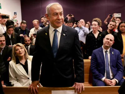 Israeli Prime Minister Benjamin Netanyahu attends a hearing in his trial on corruption charges at the district court in Tel Aviv on December 10, 2024. Netanyahu, the first sitting prime minister of Israel to face a criminal trial, testified for the first time when his corruption case resumed on December 10 on charges of bribery, fraud and breach of public trust in three separate cases.   MENAHEM KAHANA/Pool via REUTERS