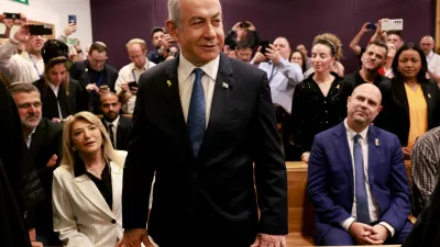 Israeli Prime Minister Benjamin Netanyahu attends a hearing in his trial on corruption charges at the district court in Tel Aviv on December 10, 2024. Netanyahu, the first sitting prime minister of Israel to face a criminal trial, testified for the first time when his corruption case resumed on December 10 on charges of bribery, fraud and breach of public trust in three separate cases.   MENAHEM KAHANA/Pool via REUTERS