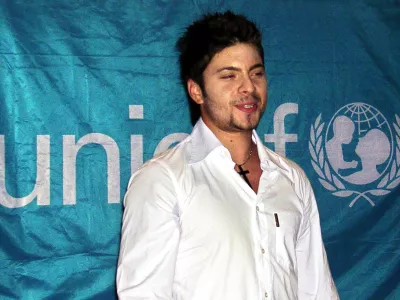 **FILE**Macedonian pop star Tose Proeski is seen by the UNICEF flag in Skopje, in this file photo from Aug. 31, 2004, the day when he becomes a regional goodwill ambassador for the UN agency for children, UNICEF.  26-year old Proeski was killed early Tuesday, Oct. 16, 2007, in a car crash at Nova Gradiska, 100 kilometres east of Zagreb, Croatia. (AP Photo)