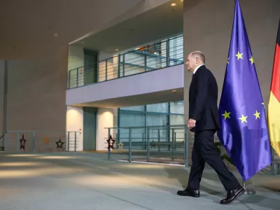 German Chancellor Olaf Scholz walks following speaking to reporters, after a December 16 confidence vote request was submitted, in Berlin, Germany December 11, 2024. REUTERS/Liesa Johannssen   TPX IMAGES OF THE DAY