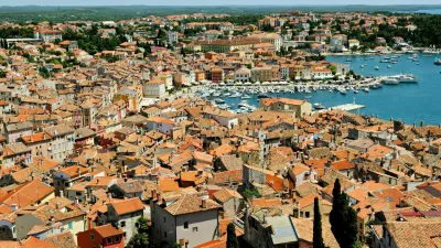 F565TA Old town and harbor of Rovinj seen from the bell tower of Saint Euphemia?s basilica, Istria, Croatia