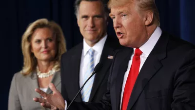 FILE - Donald Trump speaks at a news conference in Las Vegas, Thursday, Feb. 2, 2012, to endorse Republican presidential candidate, former Massachusetts Gov. Mitt Romney, center, accompanied by Romney's wife Ann. (AP Photo/Gerald Herbert, File)