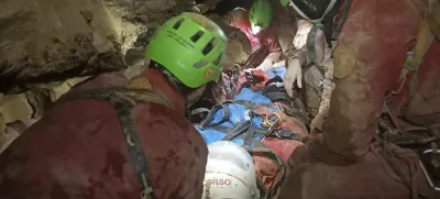 This image released Monday, Dec. 16, 2024 by the Italian Soccorso Alpino (Alpine Rescue) shows the rescue operation of Ottavia Piana, a caver blocked in a deep inside the Bueno Fonteno cave, near Bergamo, Italy, after falling some 5 meters (16 feet) Saturday evening during an expedition. (Soccorso Alpino via AP)