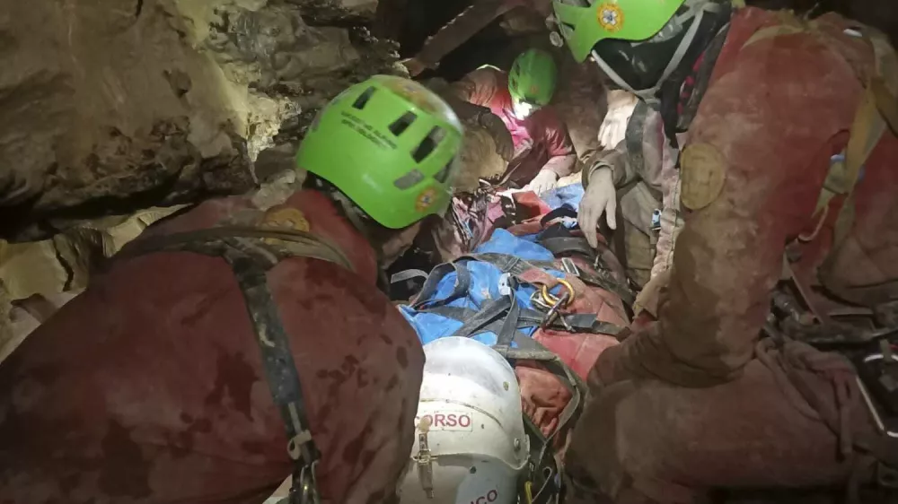 This image released Monday, Dec. 16, 2024 by the Italian Soccorso Alpino (Alpine Rescue) shows the rescue operation of Ottavia Piana, a caver blocked in a deep inside the Bueno Fonteno cave, near Bergamo, Italy, after falling some 5 meters (16 feet) Saturday evening during an expedition. (Soccorso Alpino via AP)