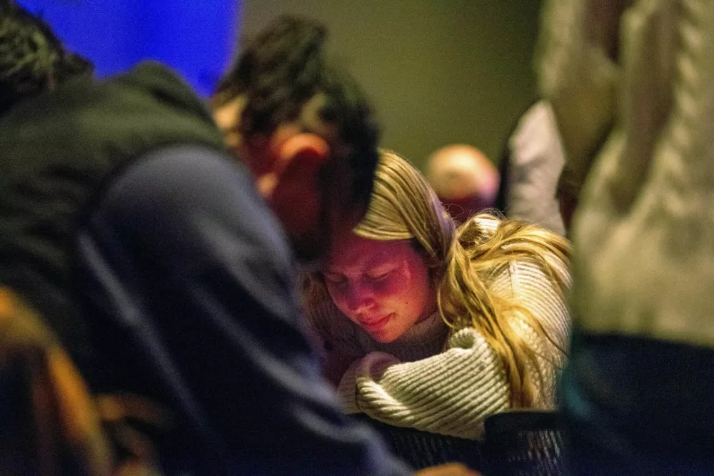 Worshipers at Blackhawk Church gather to pray for victims and survivors of a shooting at Madison's Abundant Life Christian School, in Middleton, Wisconsin, U.S. December 16, 2024. REUTERS/Cullen Granzen