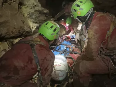 This image released Monday, Dec. 16, 2024 by the Italian Soccorso Alpino (Alpine Rescue) shows the rescue operation of Ottavia Piana, a caver blocked in a deep inside the Bueno Fonteno cave, near Bergamo, Italy, after falling some 5 meters (16 feet) Saturday evening during an expedition. (Soccorso Alpino via AP)