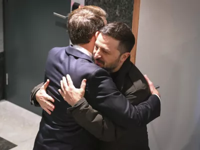 French President Emmanuel Macron, left, greets Ukraine's President Volodymyr Zelenskyy prior to a meeting in Brussels on Wednesday, Dec. 18, 2024. (Nicolas Tucat, Pool Photo via AP)