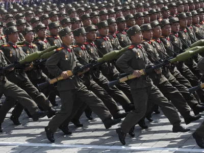 FILE - North Korean soldiers march during a mass military parade in Pyongyang's Kim Il Sung Square to celebrate 100 years since the birth of North Korean founder, Kim Il Sung on April 15, 2012. (AP Photo/Ng Han Guan, File)